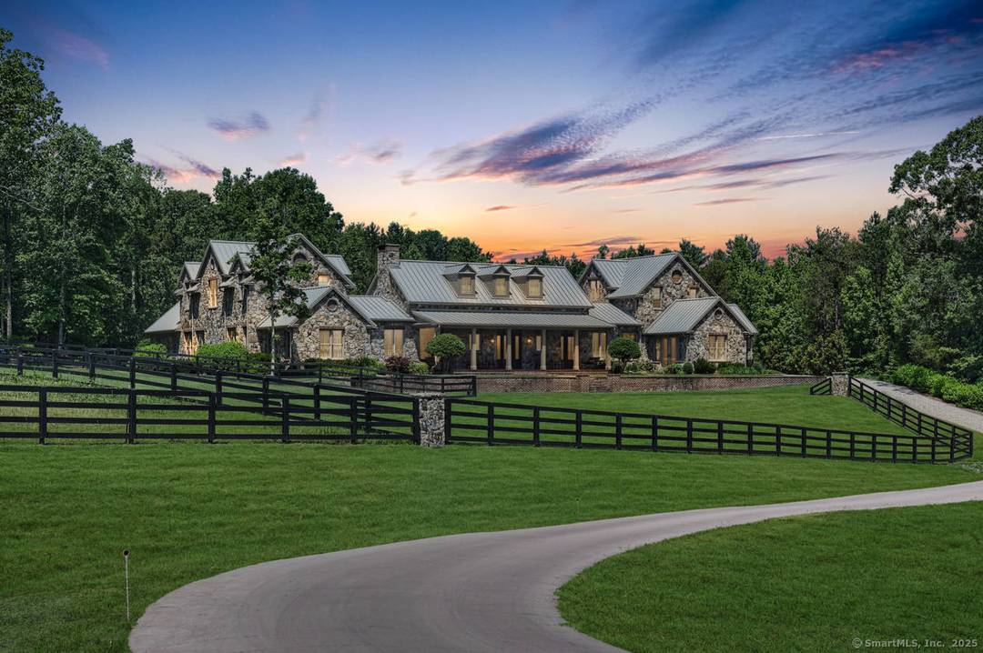 Imagine your dream estate nestled on this breathtaking 12 acre parcel, surrounded by scenic views and luxurious homes.