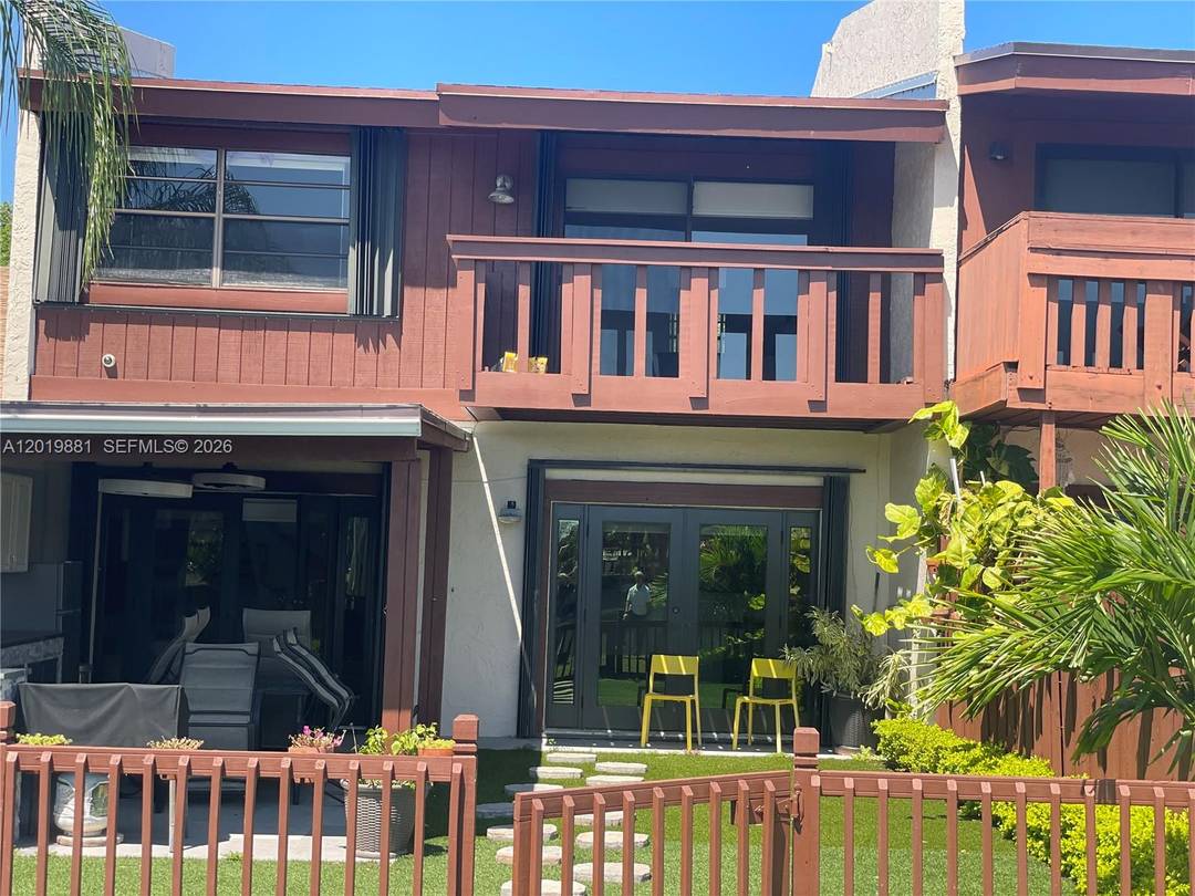 Beautiful 3 2 townhouse in Meadow Brook with more than 200, 000 in upgrades Barbecue area with built in grill and relaxing view to the lake, surrounded by an artificial ...