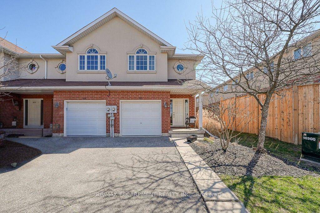 Stunning 3 bedroom, 2. 5 bath freehold end unit townhome at 67 20 McConkey Crescent in Brantford.