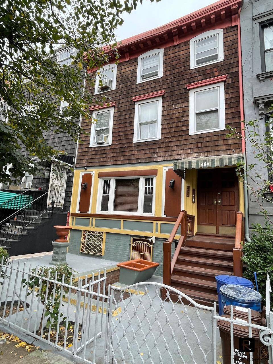 Charming two family wood frame house in Clinton Hill.