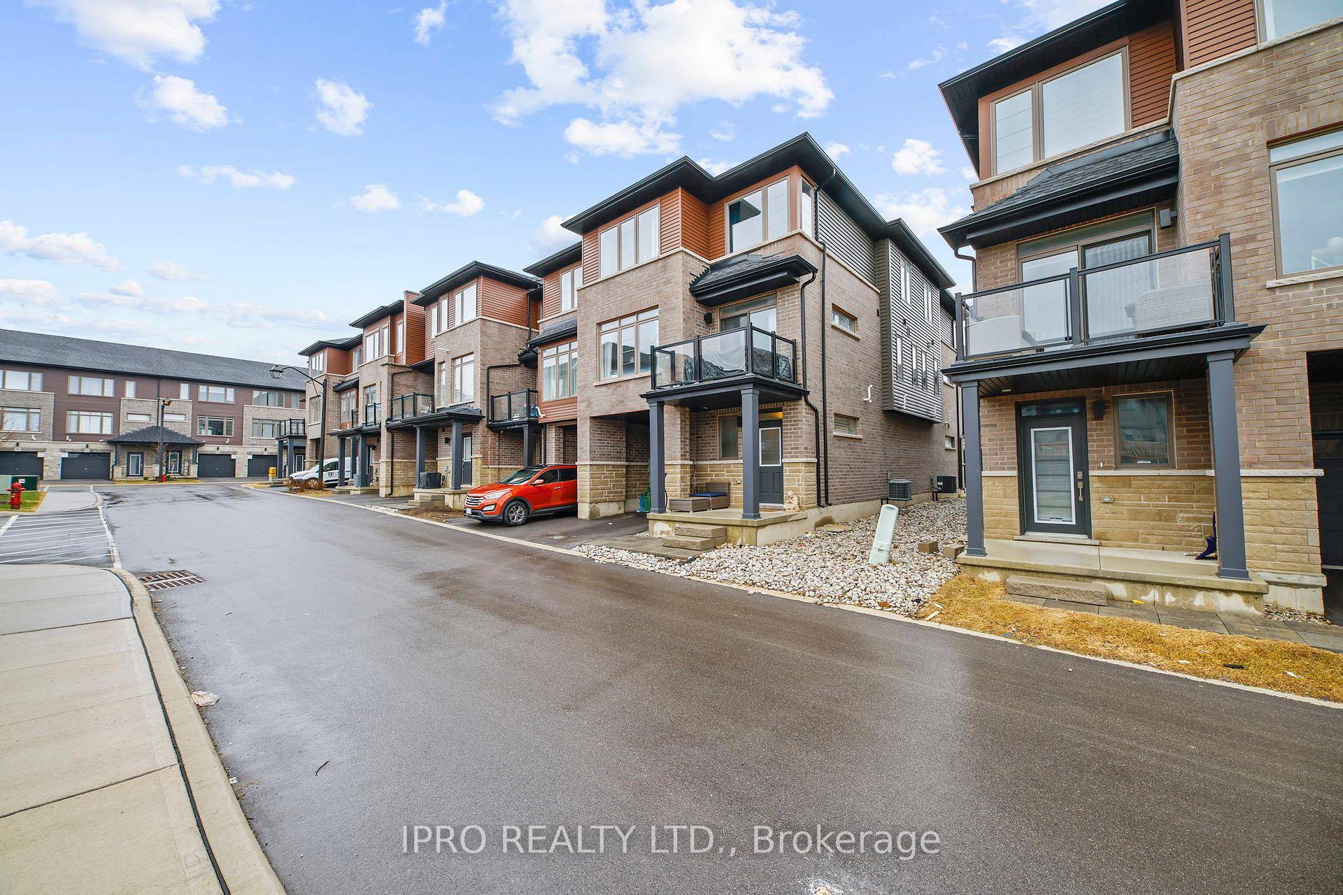 Welcome to 61 Soho Street, Unit 123, a beautifully crafted END UNIT freehold townhouse nestled in the highly desirable Central Park community !
