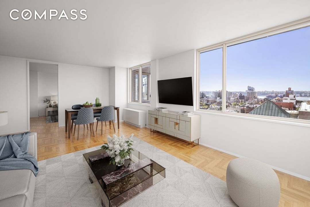 This beautiful corner 2 bedroom, 2 bathroom residence offers a thoughtfully designed layout with split bedrooms on each wing, ensuring maximum privacy.