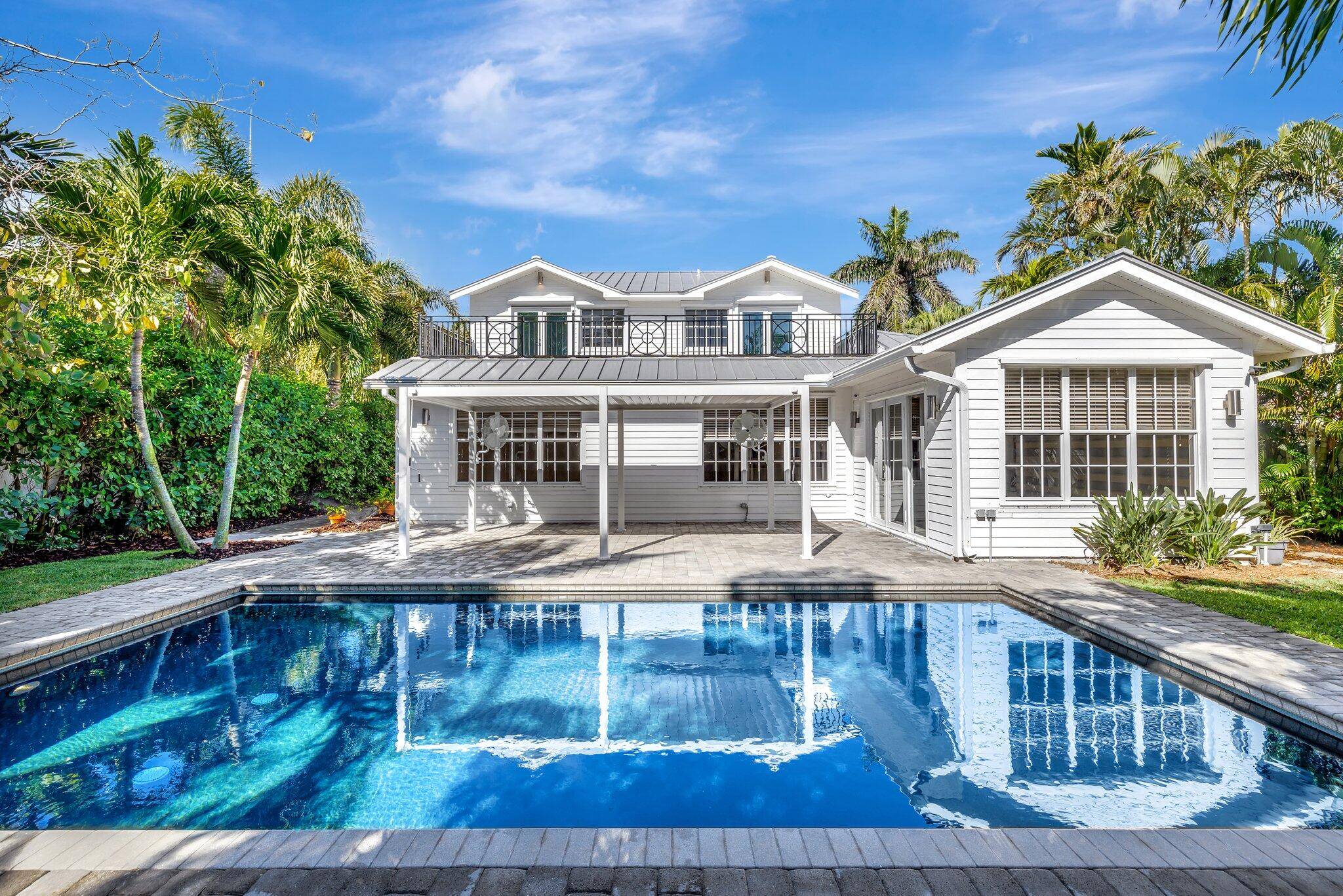Indulge in luxury living on exclusive Hypoluxo Island !