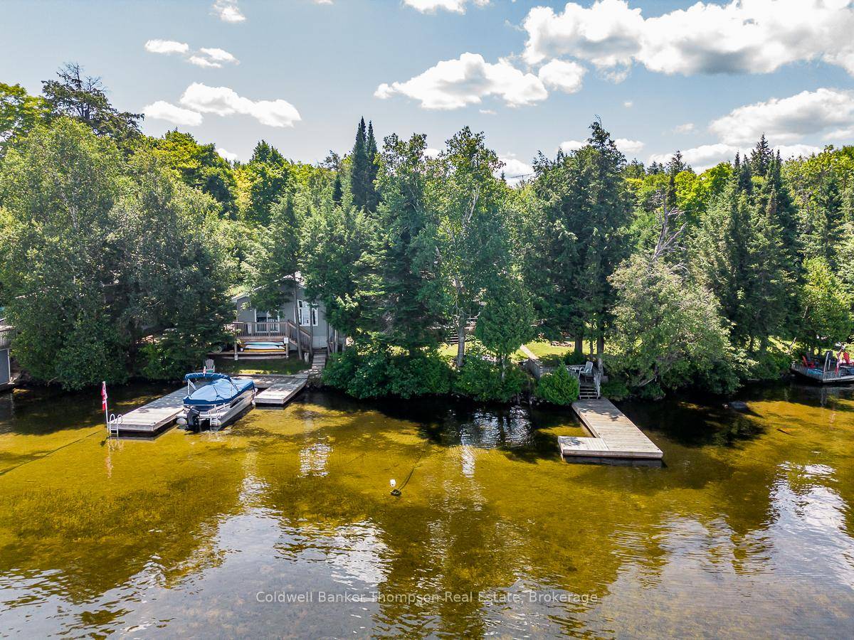 Amazing opportunity to own two cottages on Lake of Bays with west exposure and views of Bigwin Island !