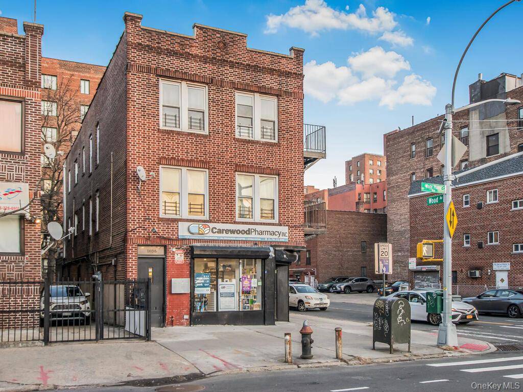 Detached brick mixed use building with R6 zoning located on busy White Plains Road near Hugh J.