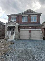 This Beautifully Designed Home Features A Stone Finished Front Elevation With Heritage Style Brick, Offering Exceptional Curb Appeal.