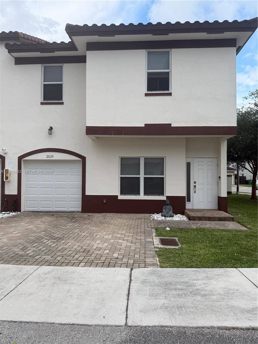 Beautifully maintained corner unit two story condo townhome located in a highly desirable area of Miami.