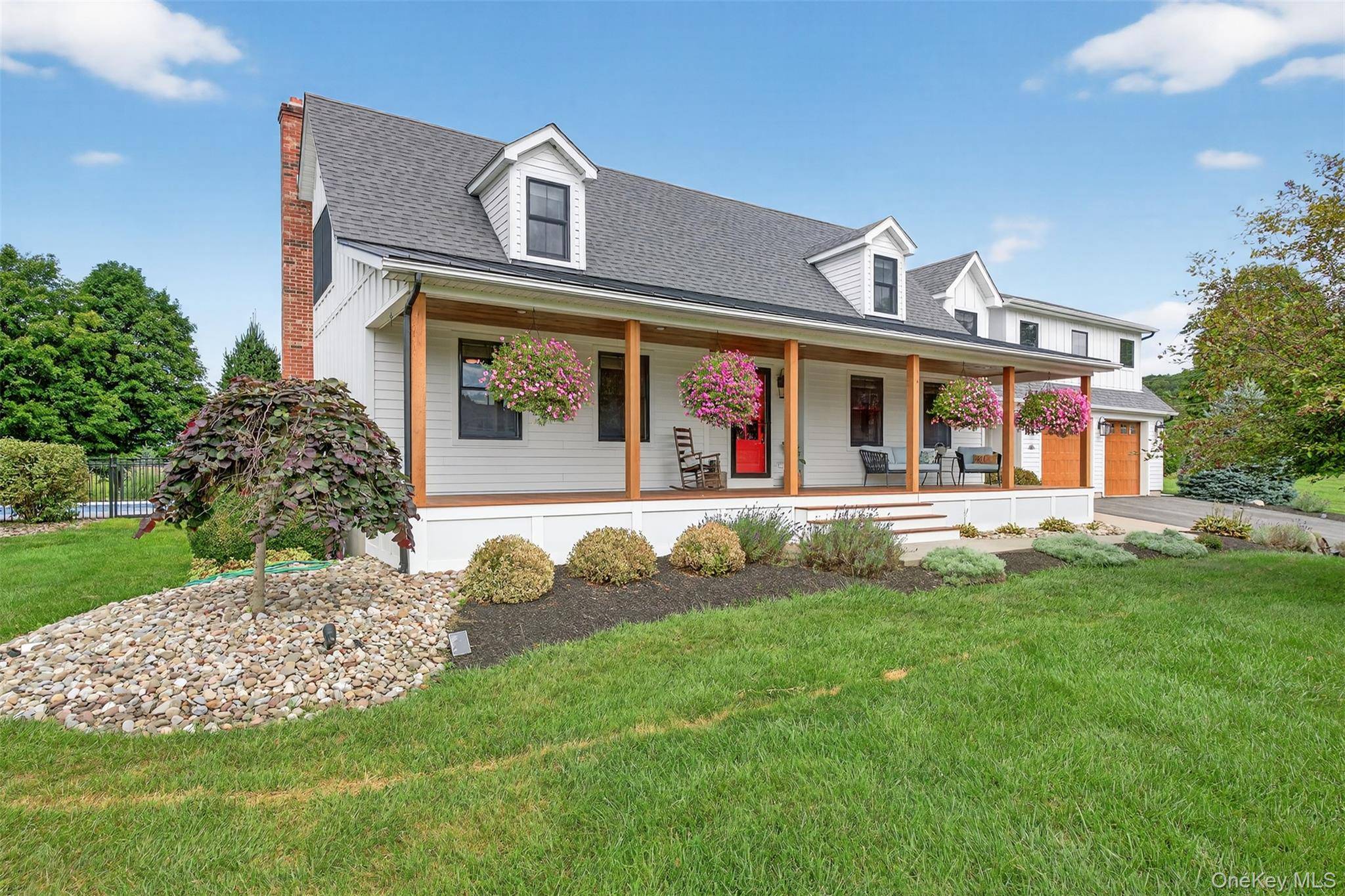 Just 90 minutes from New York City, this extraordinary turnkey farmhouse has been completely reimagined with meticulous attention to detail, blending timeless Hudson Valley charm with modern luxury living.