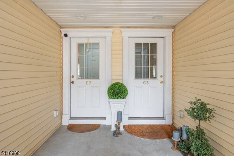 Tucked into the Lions Gate community, just moments from Caldwell's downtown and nearby NYC transportation, this move in ready townhouse spans three levels.