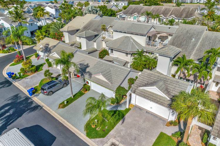 Discover this beautifully renovated 4 bedroom, 3 bathroom three story townhome in the heart of Jupiter, where the location is unbeatable.