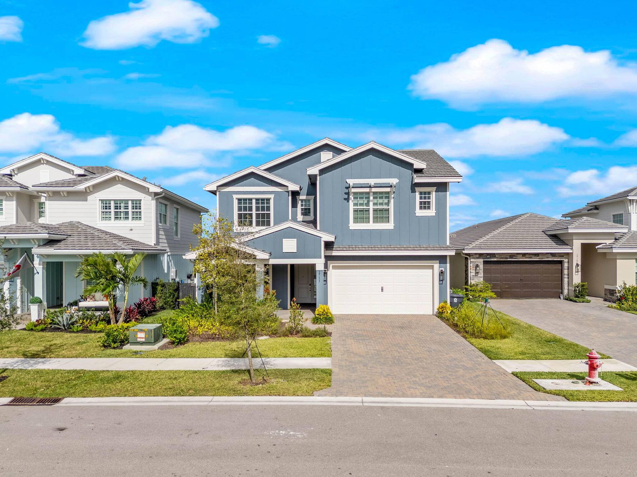 Experience unparalleled luxury in this exquisite Huntington model by GL Homes, a true entertainer's dream offering 5 bedrooms, 4.