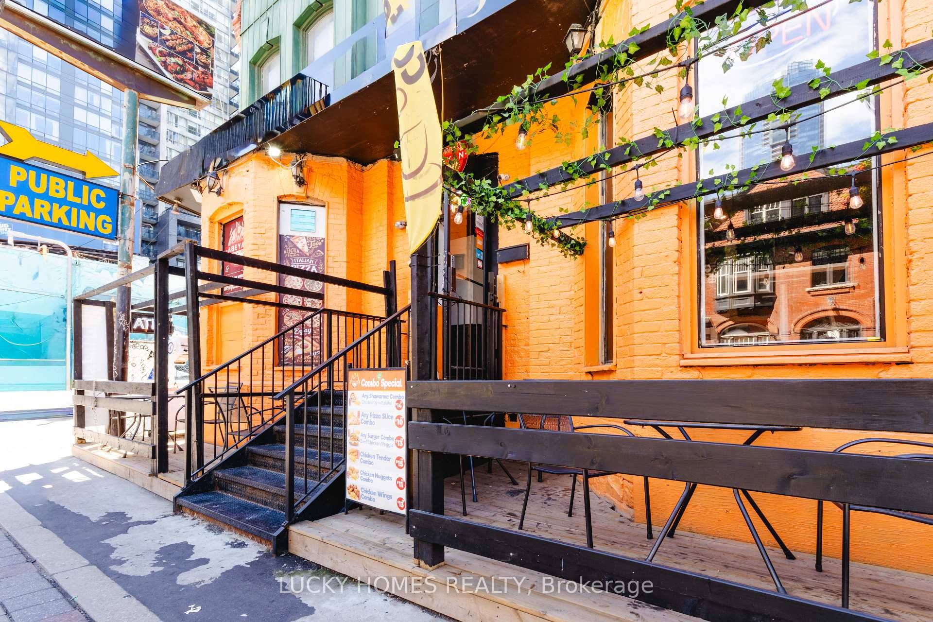One of the unique pizza places located in Torontos thriving Entertainment District at 118 John Street, surrounded by theatres, offices, condos, and major attractions.