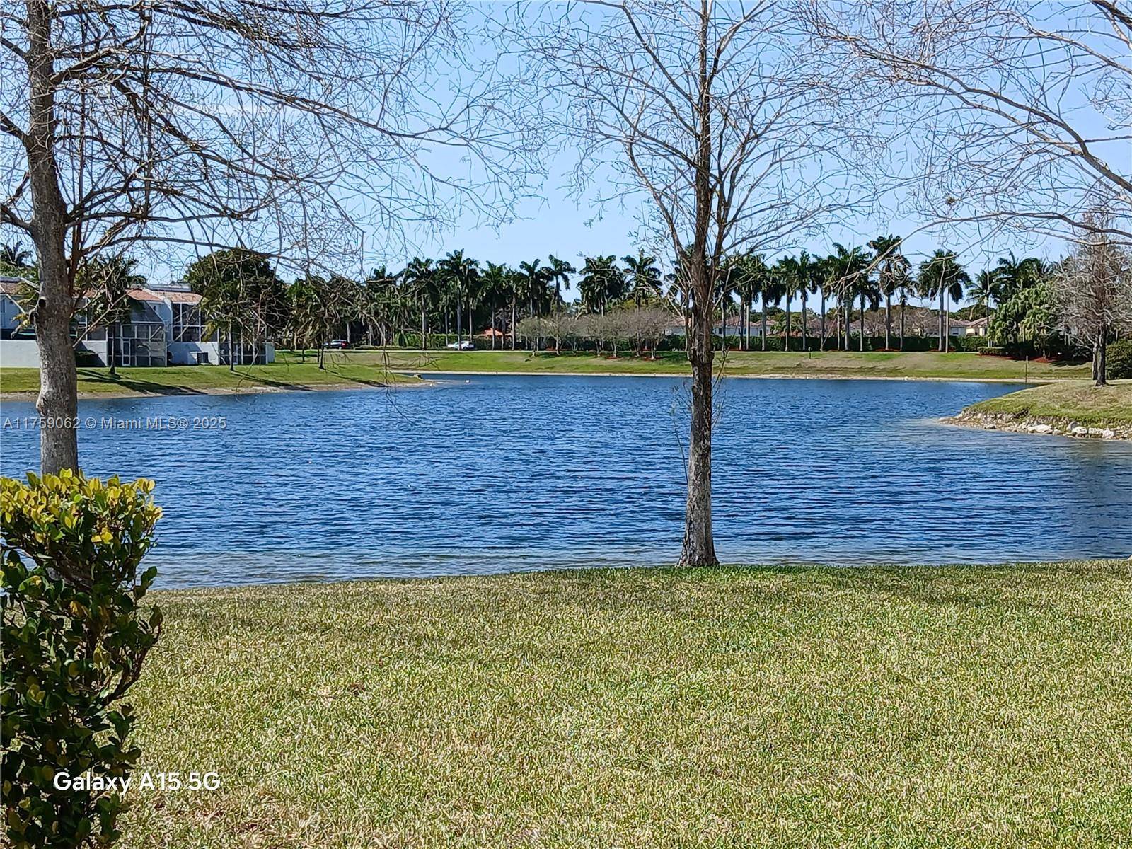 Stunning 3 bedroom, 2. 5 bathroom lagoon front unit in a resort style community in Doral.