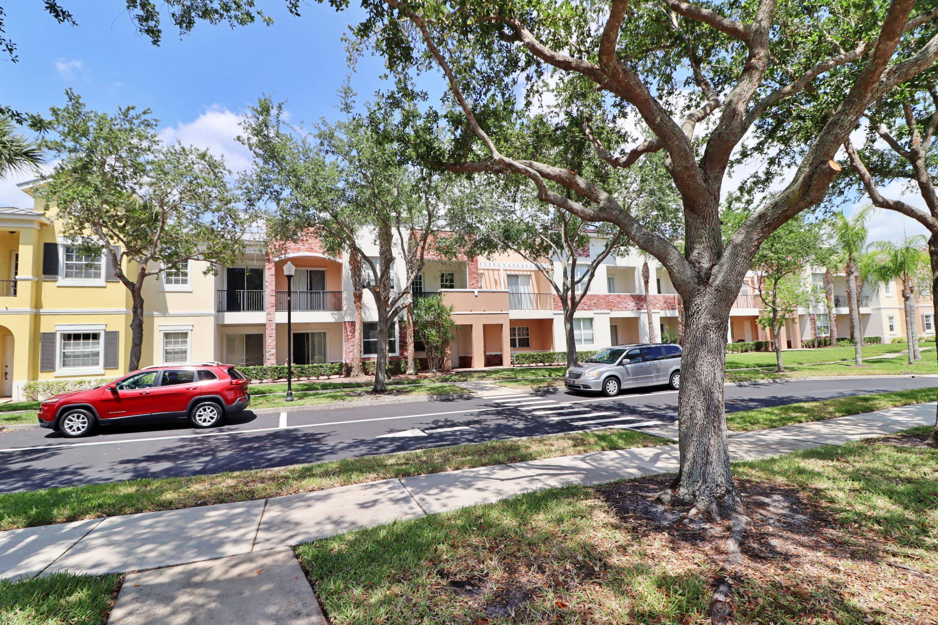 Discover this tranquil, chic, and sunny 2nd floor condo in the coveted Promenade at Tradition with pool and tropical green space views.