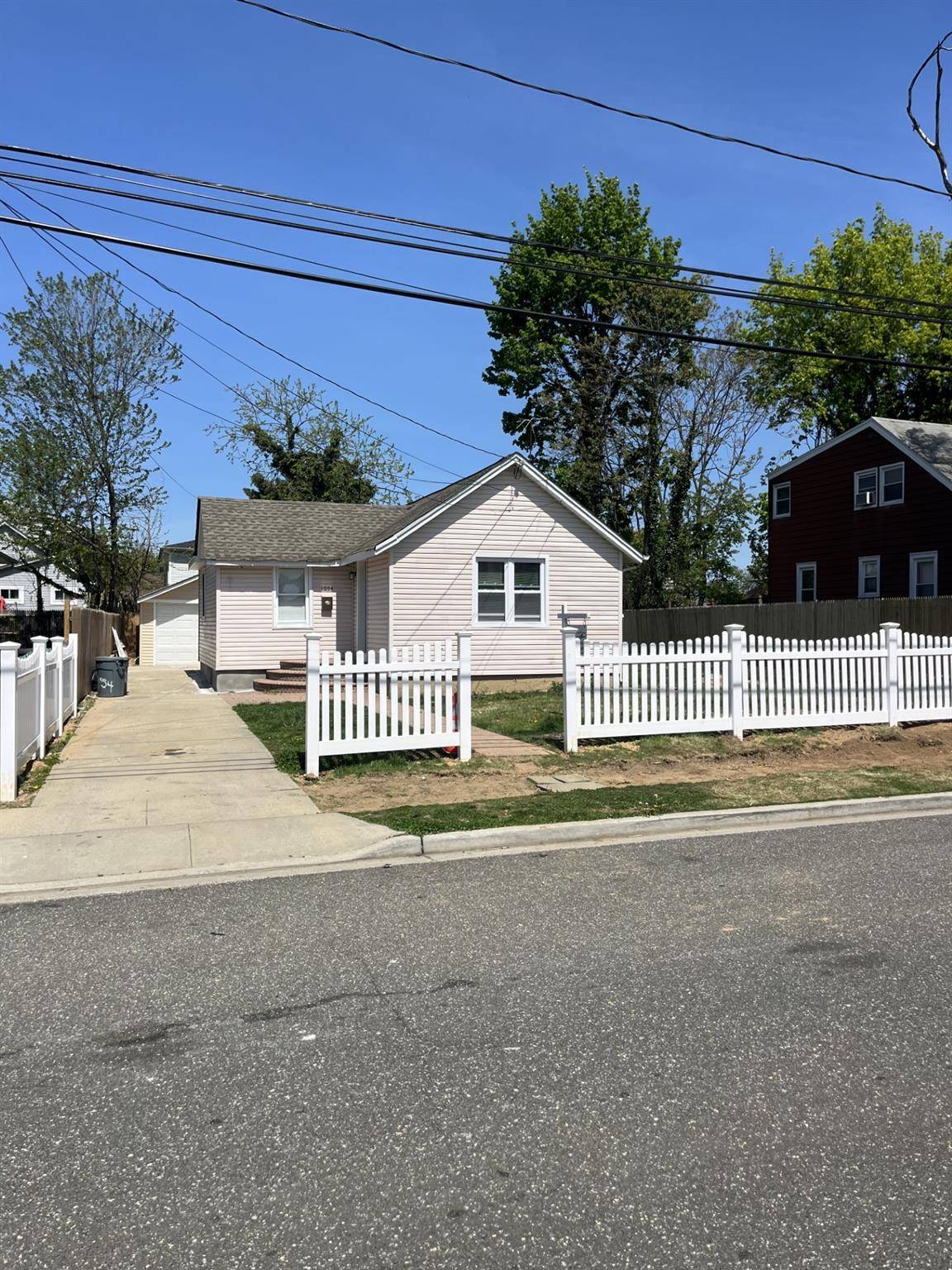 Totally Redone 3 bedroom 2 full bathrooms Living Room, Dining Area, Kitchen, Full Finished Basement, private driveway, 1 detached garage.