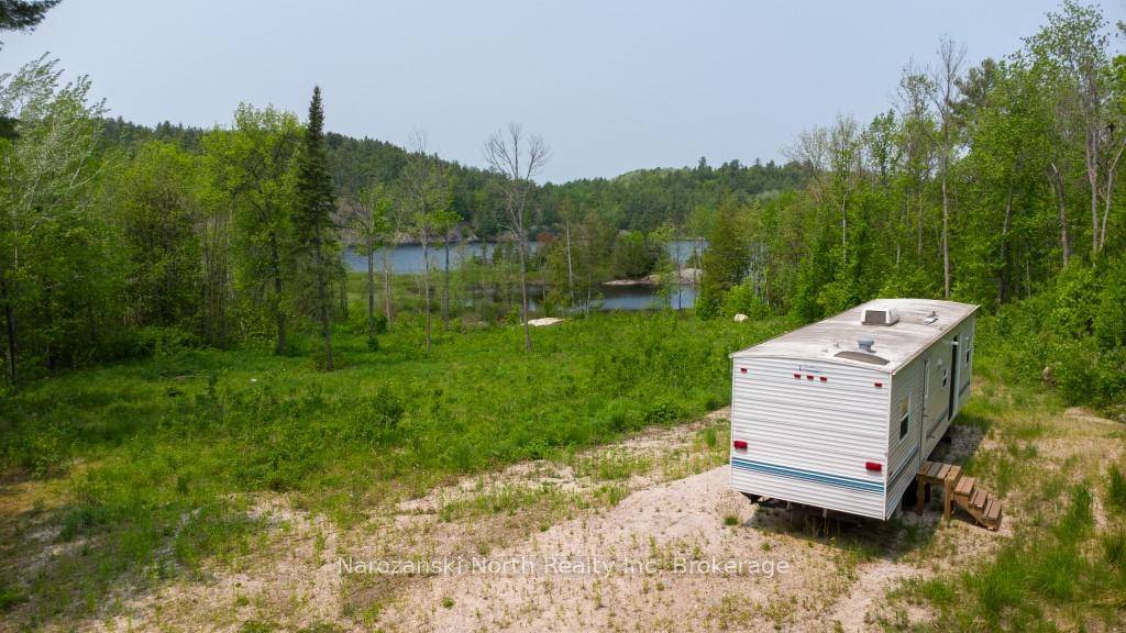 You can make a grand entrance on the Lower Sturgeon Lake with this 7 acre parcel of Waterfront land !