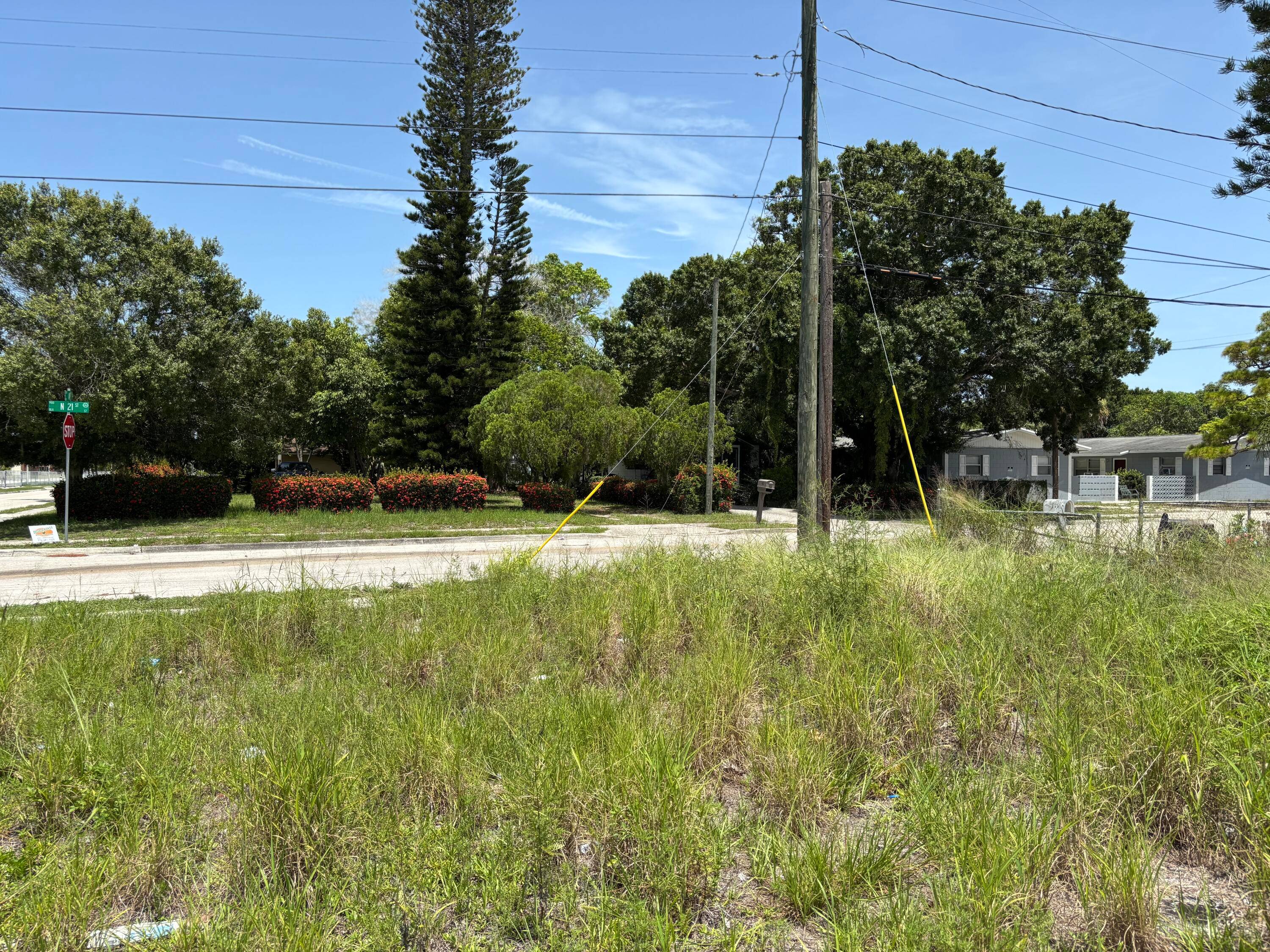 Cleared corner lot. Walking distance to local stores.