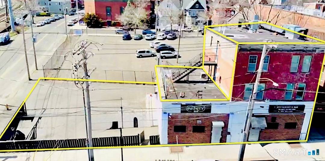 Fully occupied mixed use property generating current rental income with potential for future increases.