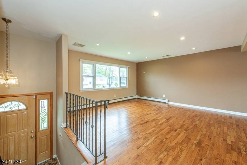With over 2, 600 square feet of living space, this expanded custom bi level offers all the space you need.
