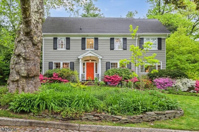 Timeless architecture, refined updates, and an exceptional location come together in this quintessential center hall colonial in the heart of Maplewood.