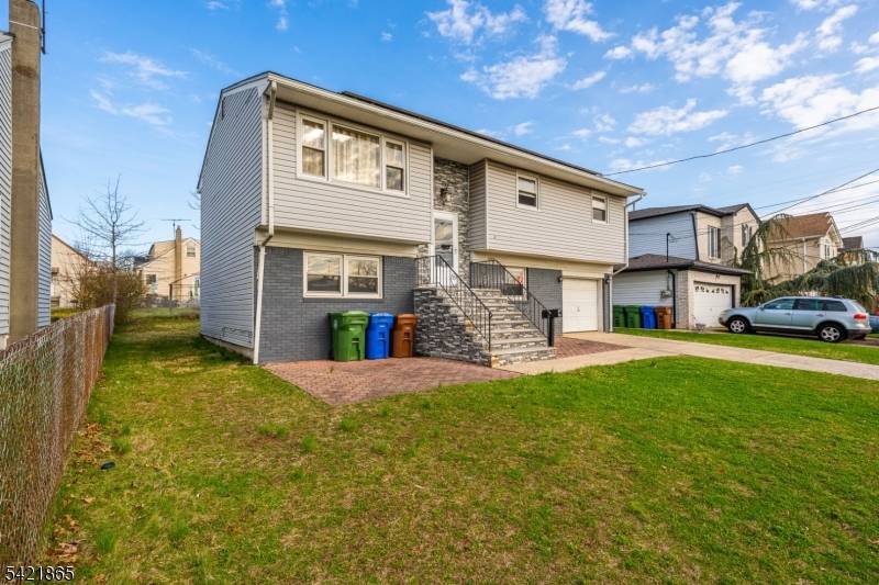 Welcome to this Spacious 5 Beds 2 Baths Classic Bi Level home offering the perfect blend of space, comfort and style.