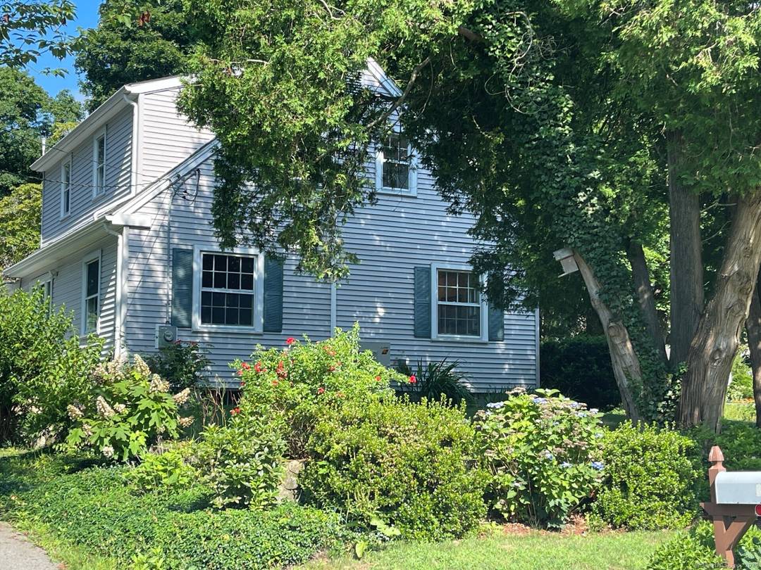 Welcome to this beautifully appointed 3 bedroom, 2 bath home located on a quiet, picturesque street just a short distance from vibrant downtown Mystic.