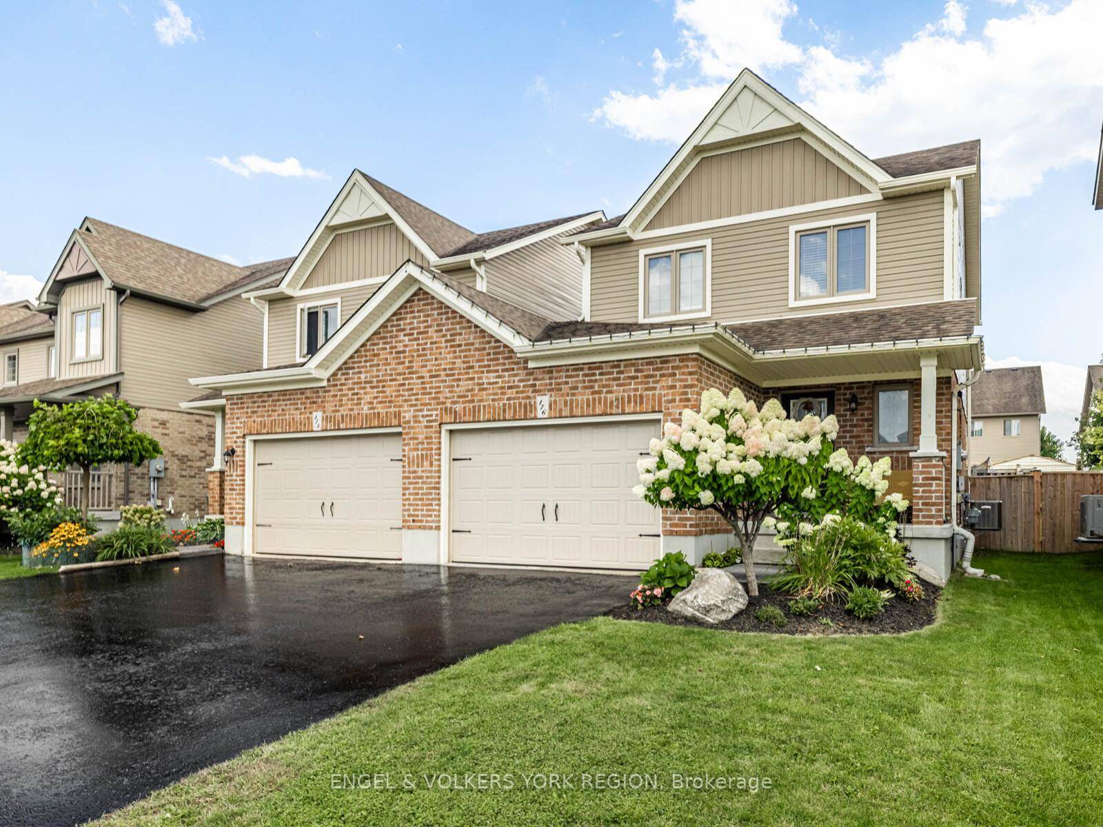 This well maintained link property offers the feel and space of a detached home, with only the garage wall shared, ensuring privacy, comfort, and quiet living without the higher cost ...