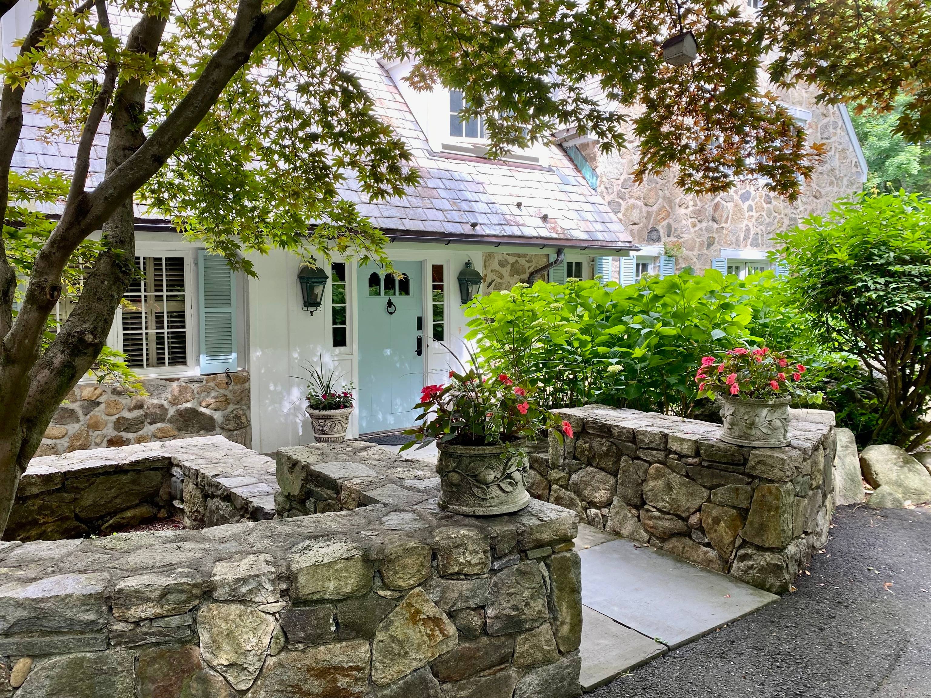 Very special Frasier Peters Stone home with all the charm of the English Countryside !