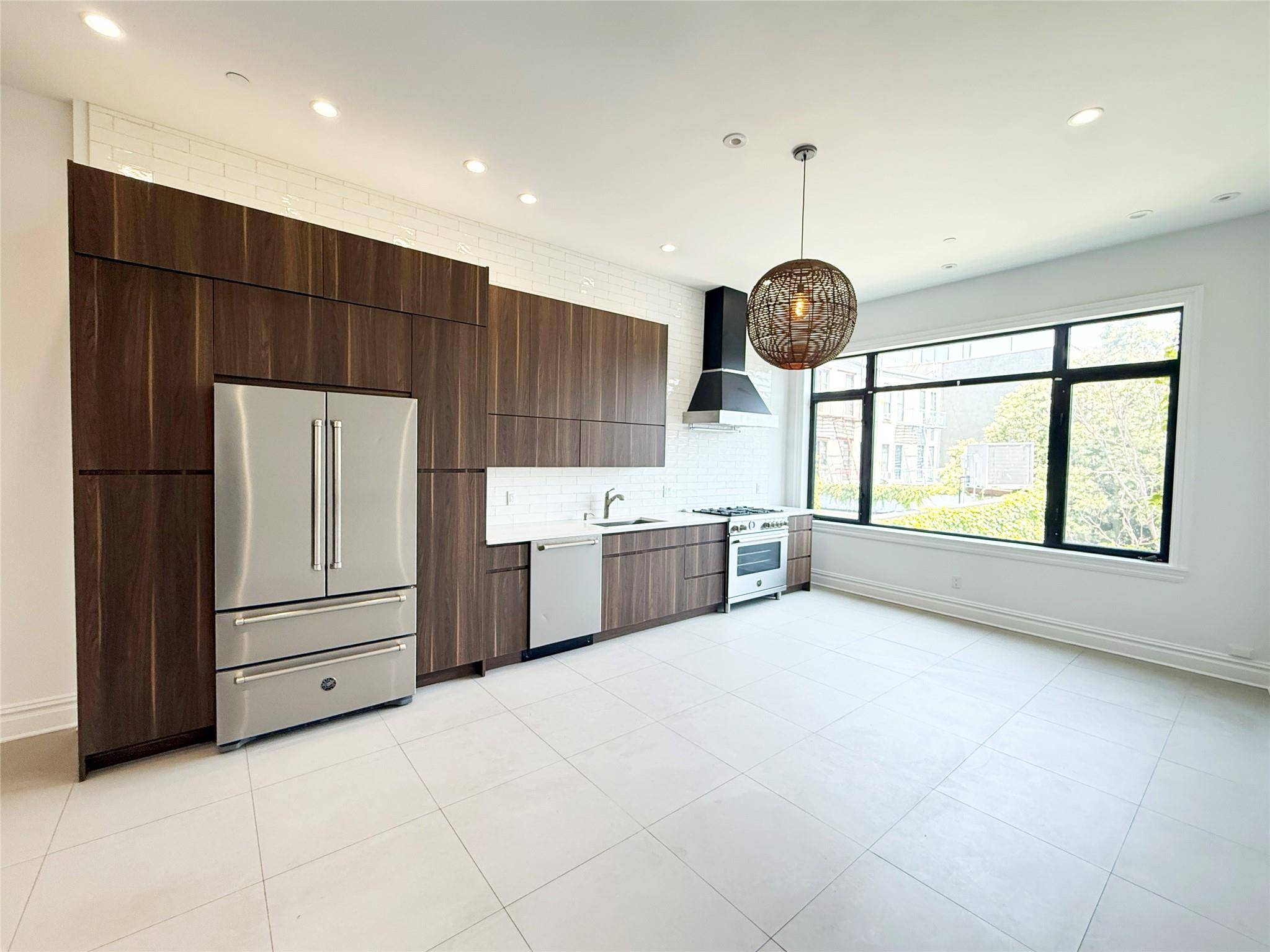Welcome to 333 Tompkins Avenue PH, a striking and expansive four bedroom, four bathroom home in the heart of Bed Stuy.
