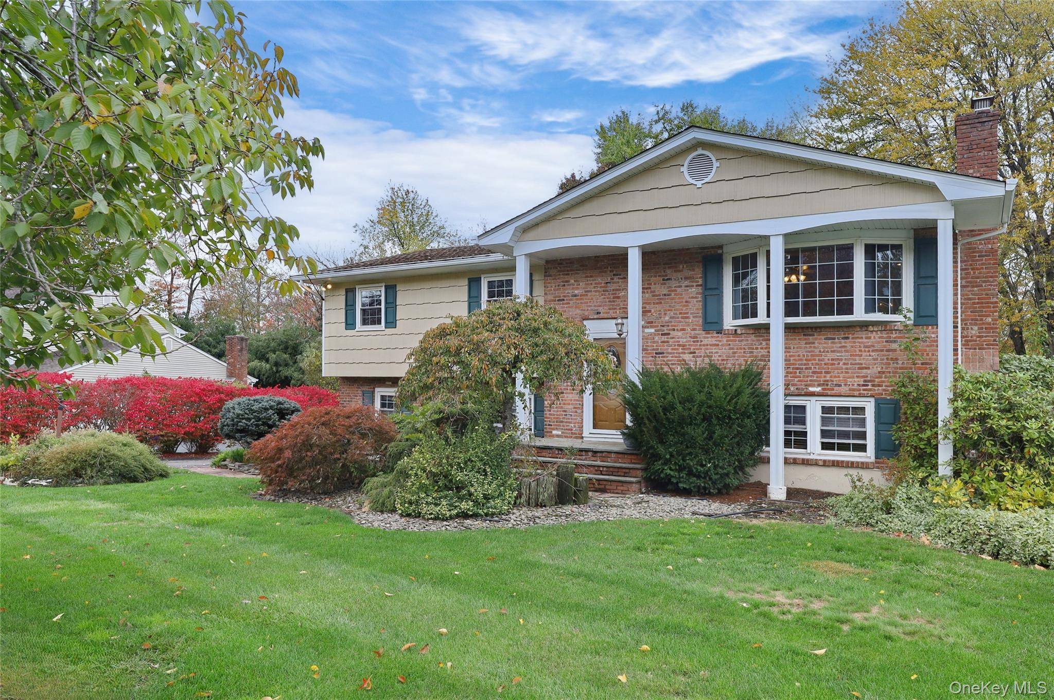 Great Opportunity ! Spacious 2000 Sq', 4 bedroom, 2 1 2 bath Mayfair Raised Ranch located in Historic Nanuet.
