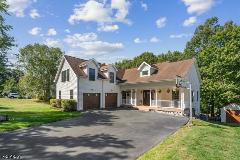 Welcome to this custom Colonial located in the desirable Alpine Estates development.