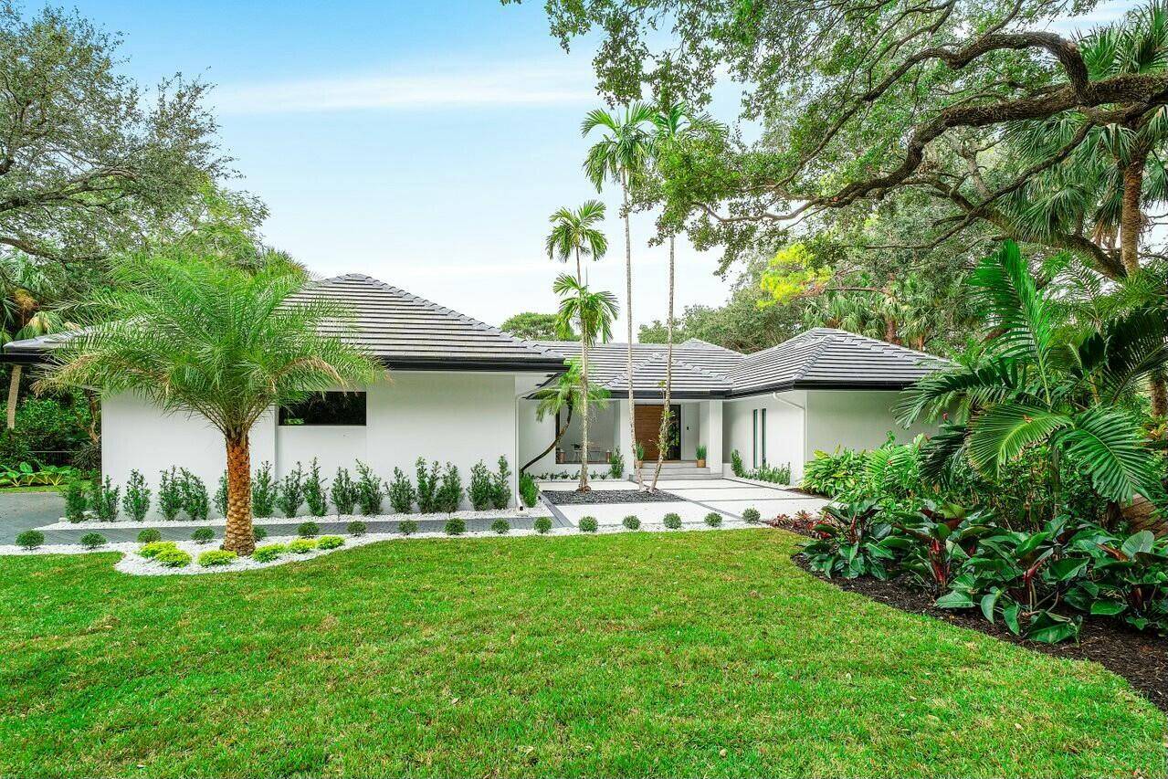 This fully reimagined contemporary gem is nestled in the prestigious Foxe Chase community, offering a perfect blend of modern luxury and serene privacy on over an acre of land.