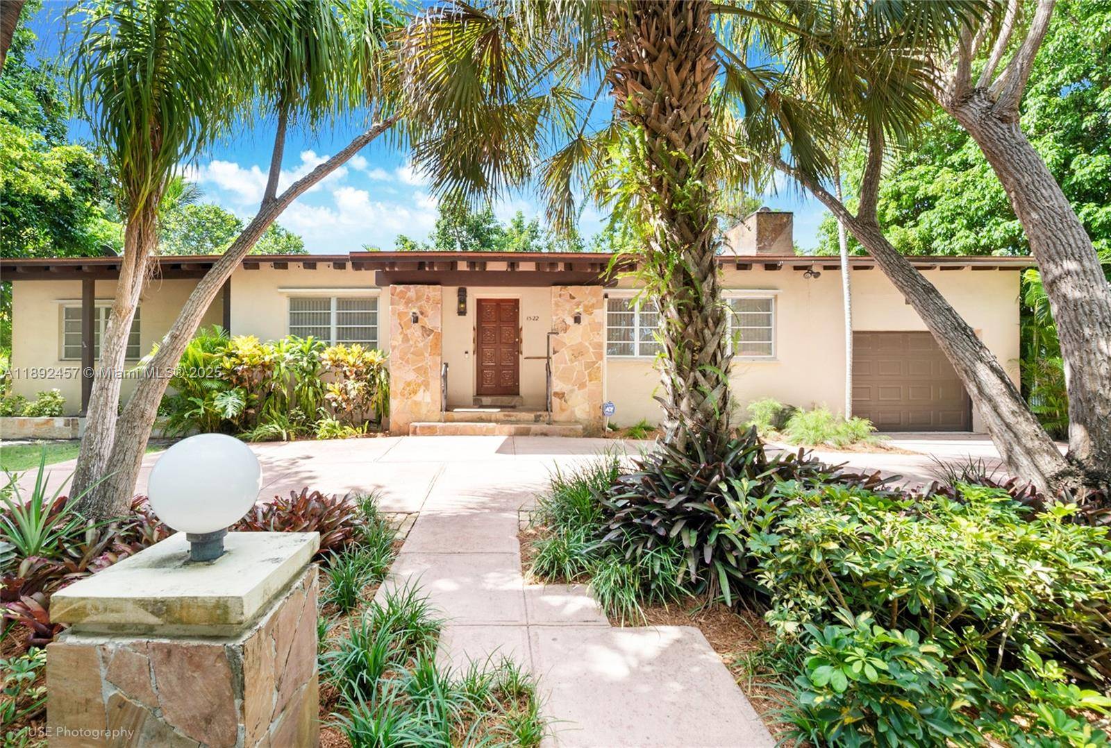 Discover the potential of this classic mid century residence nestled in the most desirable neighborhood of Coral Gables just minutes from the University of Miami.