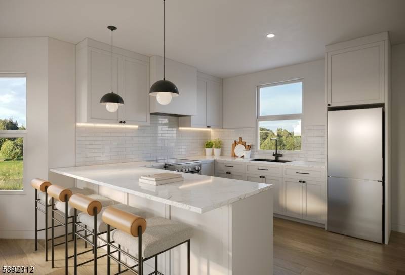 Welcome to this beautifully rebuilt brand new construction duplex condo offering the perfect blend of modern design, quality craftsmanship, and everyday functionality.