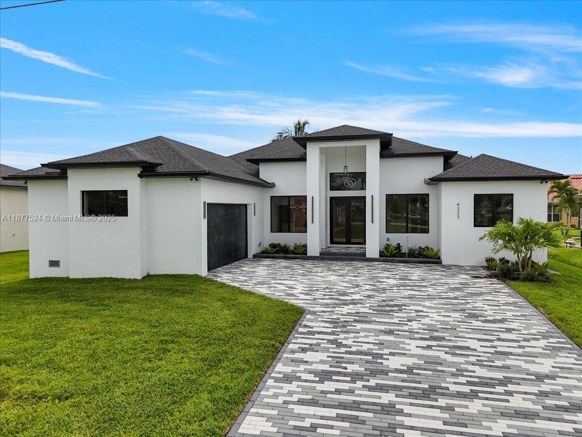 Step into this stunning new construction in SW Cape Coral !