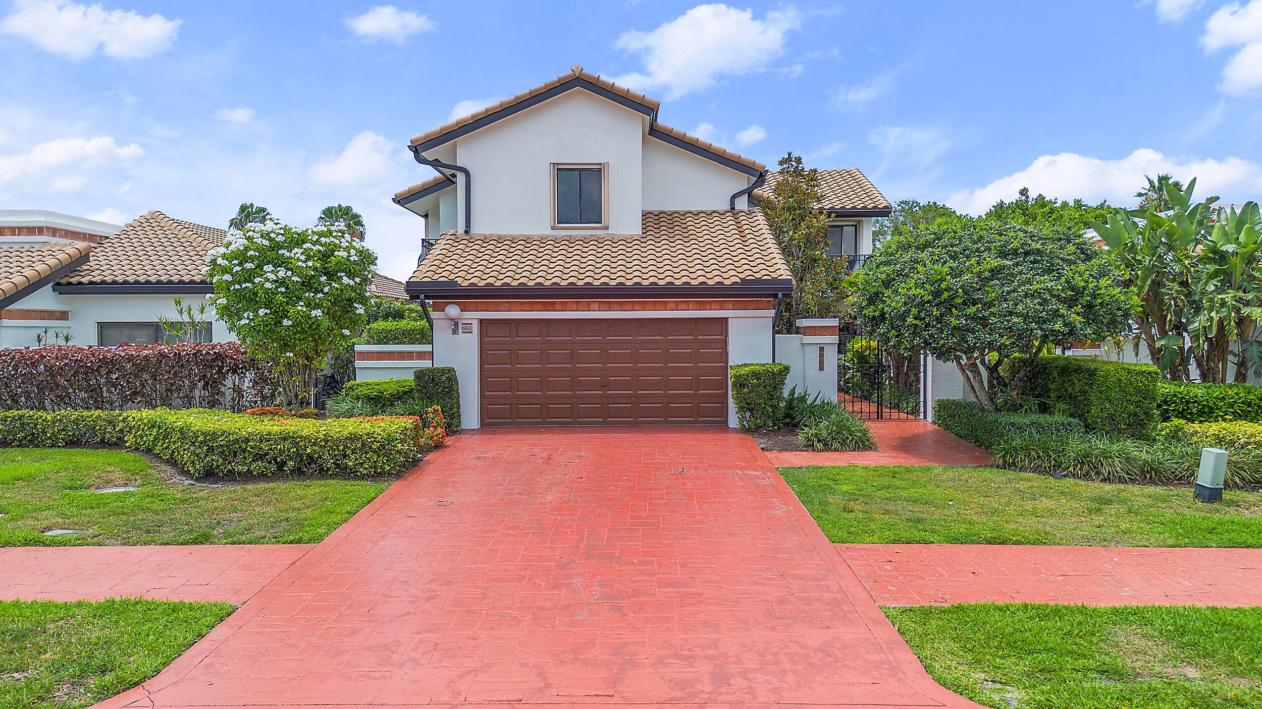 Elegant 5 Bedroom Residence in the Coveted Villa Flora at Boca Pointe, beautifully maintained 5 bedroom, 3 bathroom home offers serene lake views and an oversized pool.
