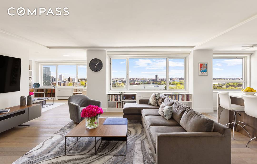 This expansive two bedroom convertible three, two and a half bath corner residence offers breathtaking, panoramic views of the East River and Carl Schurz Park from all but the secondary ...