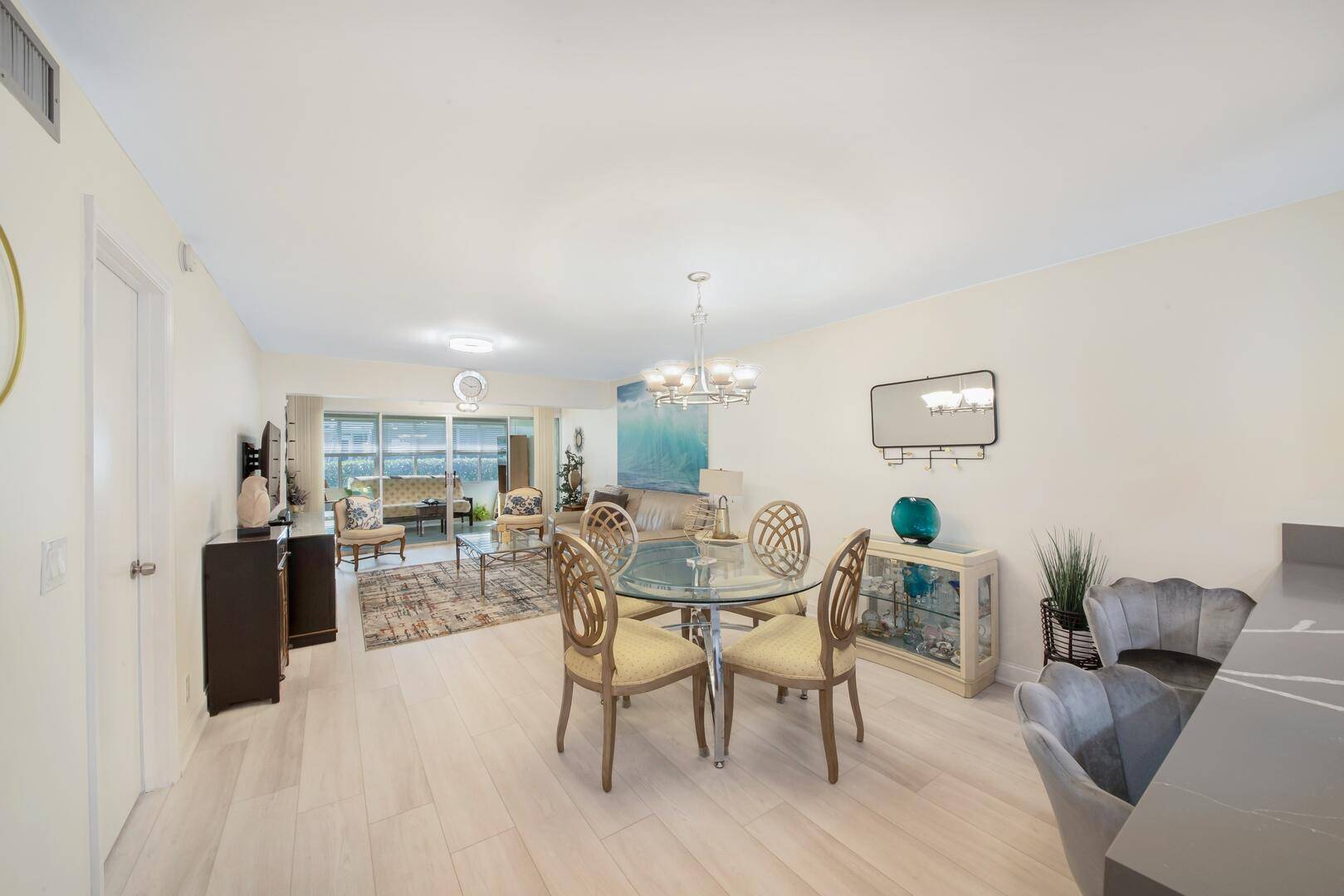 Welcome to this beautifully updated 2 bedroom, 2 bath first floor condo, offering modern finishes and effortless comfort.