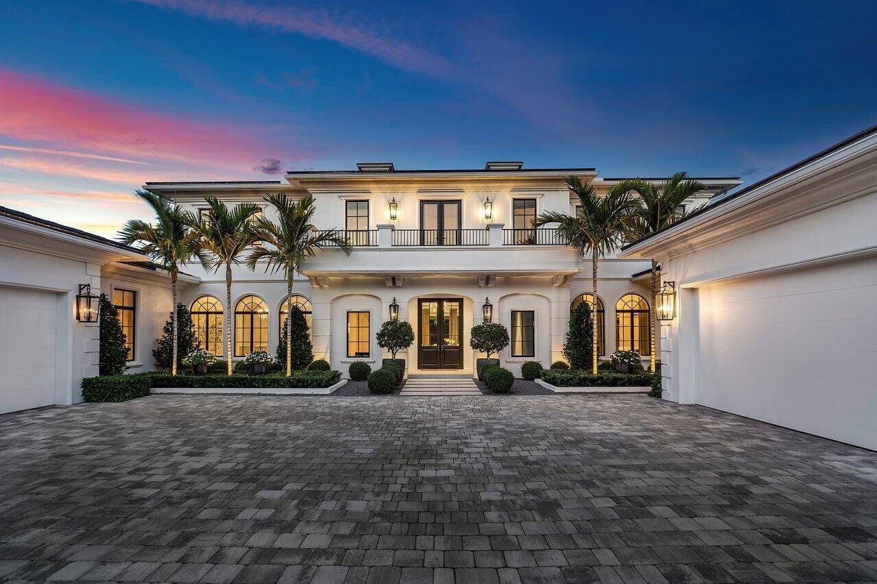 Welcome to this luxurious residence located in North Palm Beach's most prestigious community, Seminole Landing.