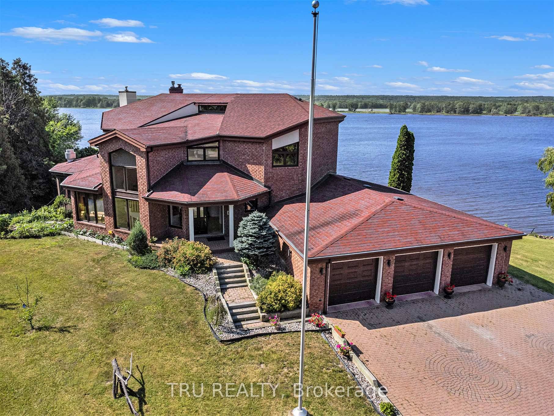 Experience luxury living in this stunning two story waterfront property featuring breathtaking views and elegant modern updates throughout.