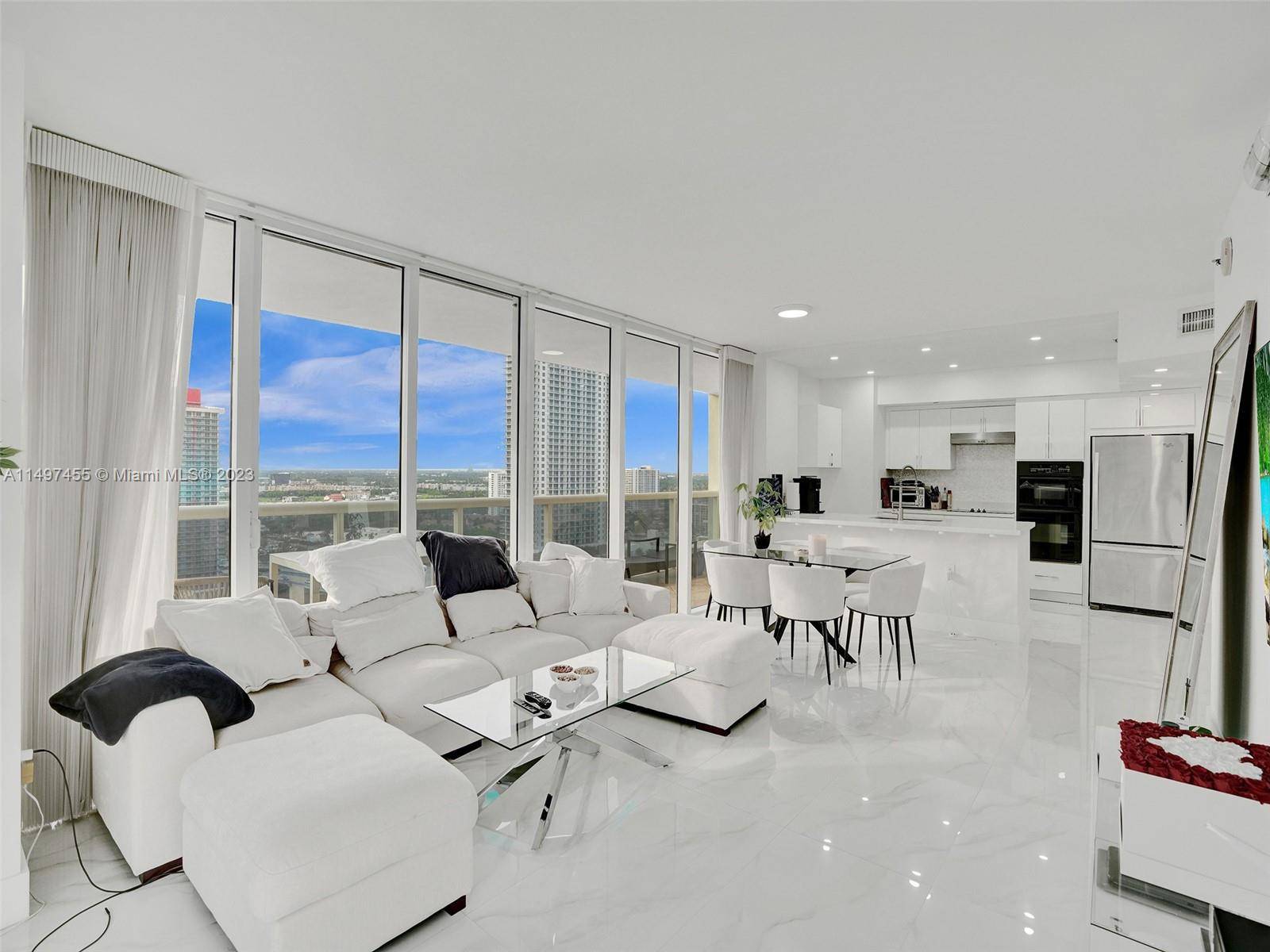 Located in the Beach Club building in Hollywood, this sophisticated two bedroom, two bathroom unit spanning 1, 458 square feet embodies an aura of modern elegance.