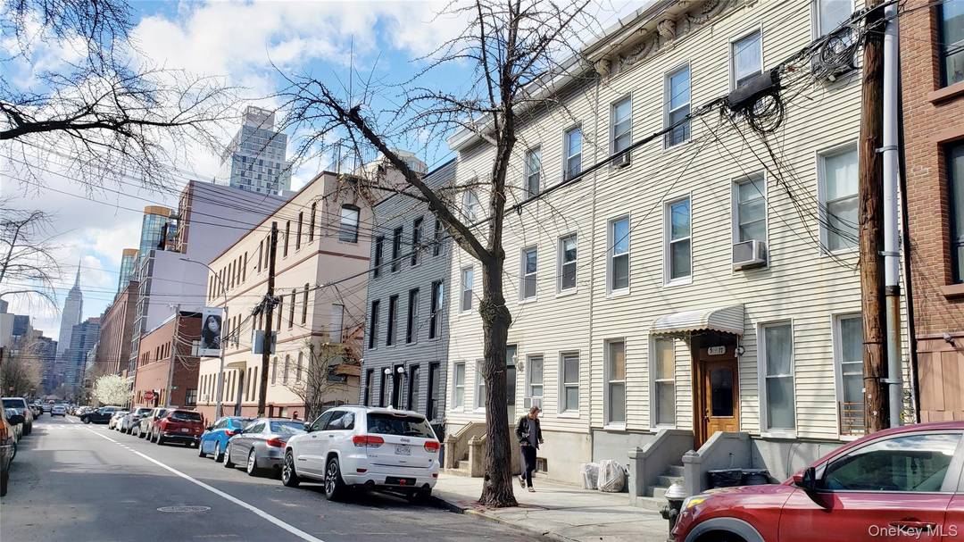 Set just one block from Gantry Plaza State Park, this refined multi family residence captures the quiet rhythm of Long Island City s waterfront where the city reveals its most ...