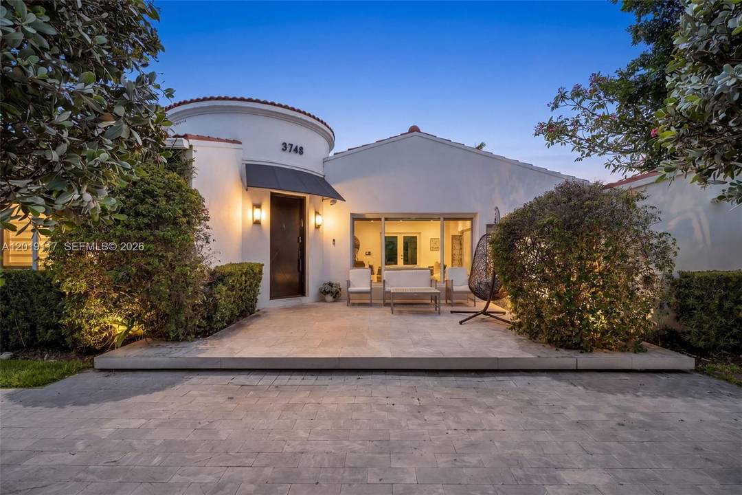Located on one of Mid Beach s most coveted tree lined streets, this exceptional residence at Prairie Avenue blends timeless Miami Beach architecture with refined modern living.