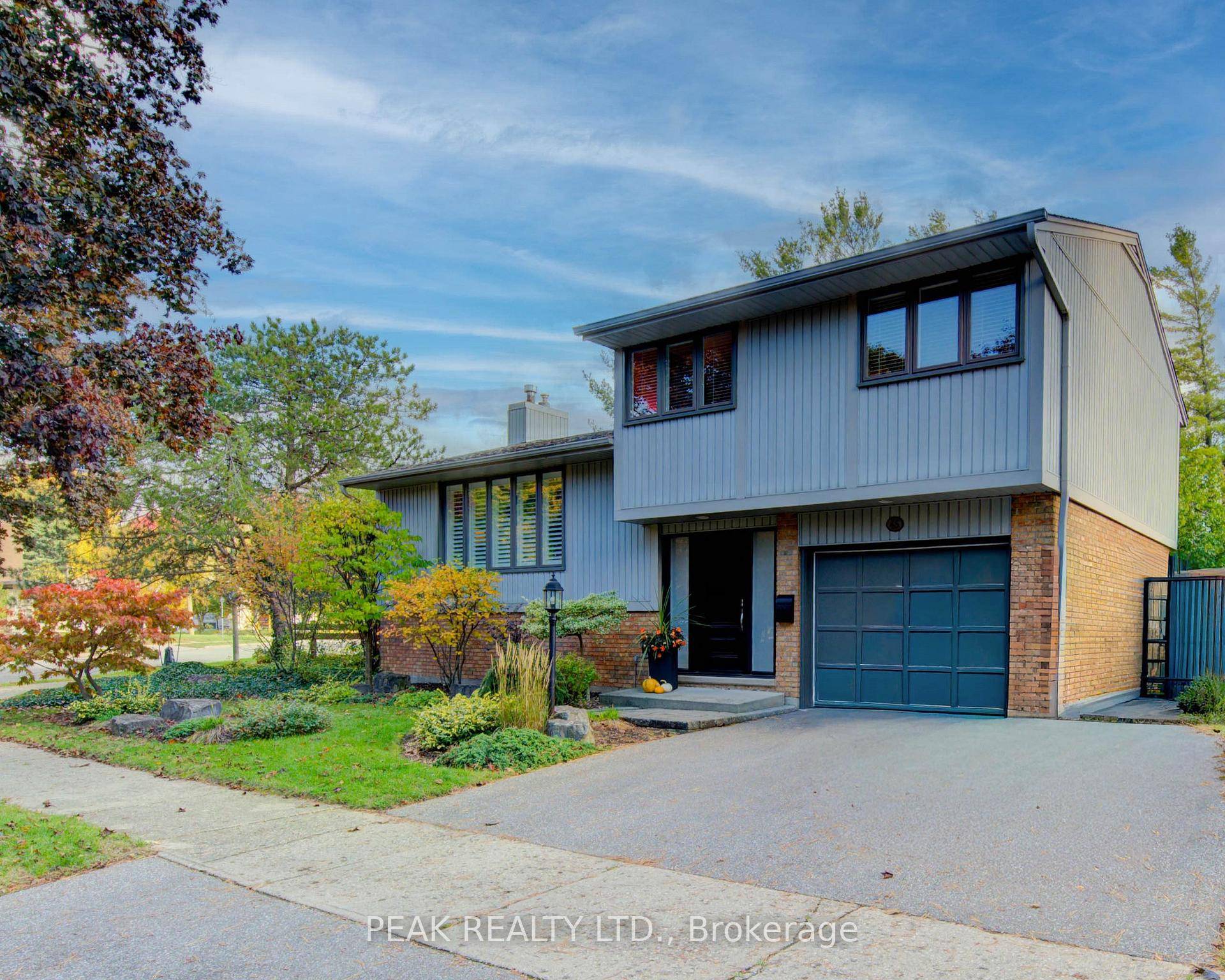 Pristine 4 level side split in exclusive and highly desired enclave of homes !