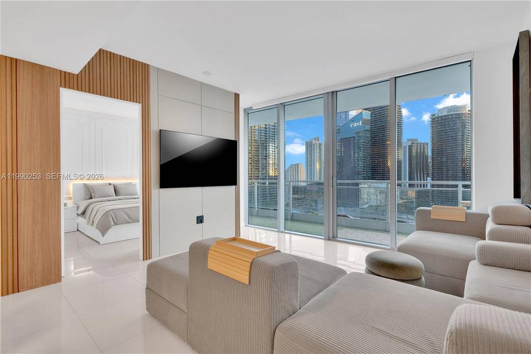 Beautifully upgraded 2BD 2BA residence at Mint with expansive river and skyline views from the 28th floor in one of Brickell s only gated riverfront communities.