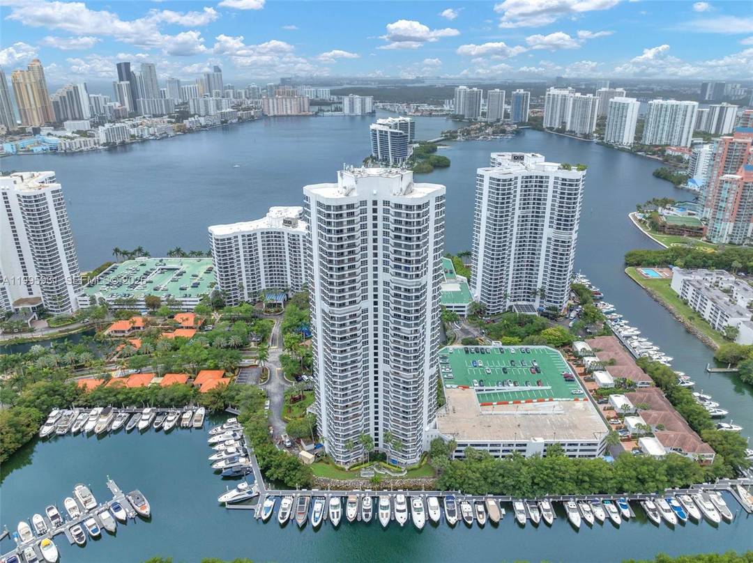 Enjoy spectacular, unobstructed views to the east, south, and west encompassing the ocean, Intracoastal Waterway, marina, golf course, and the cities of Aventura and Sunny Isles Beach from this beautifully ...
