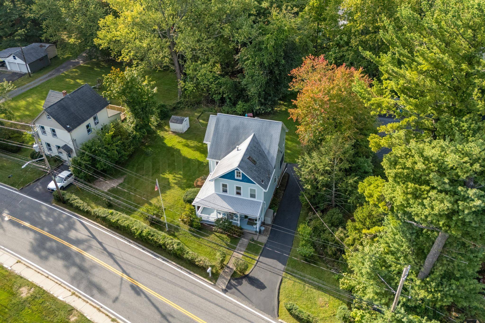 Discover the perfect blend of historic charm and modern convenience in this beautifully updated Folk Victorian home, set on over half an acre in the desirable Valley Cottage.