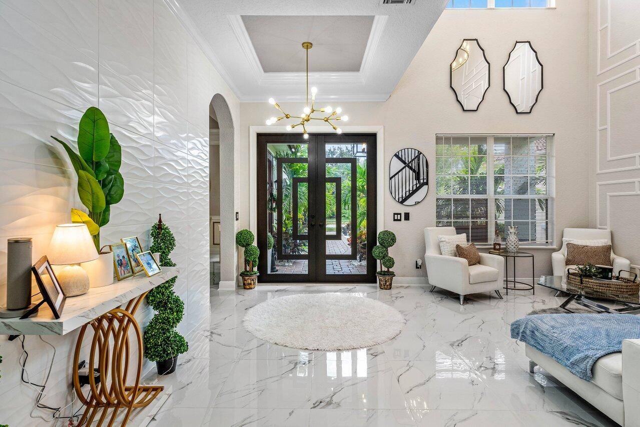 Welcome to the epitome of luxury living in the centrally gated community of Paloma.