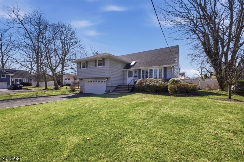 Tucked away on a quiet street just a short walk to Jefferson School, this spacious 4 bedroom, 2.