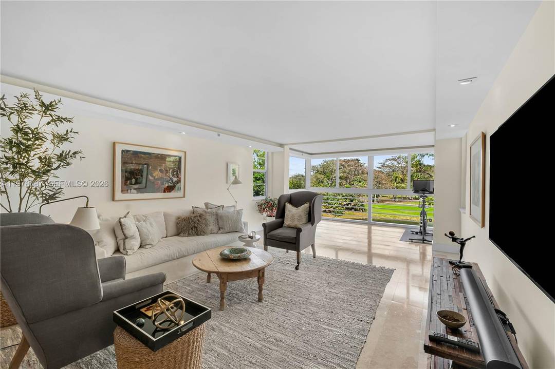 Welcome to this beautiful, bright and airy, fully updated home located in the highly sought after Palm Aire Country Club community.